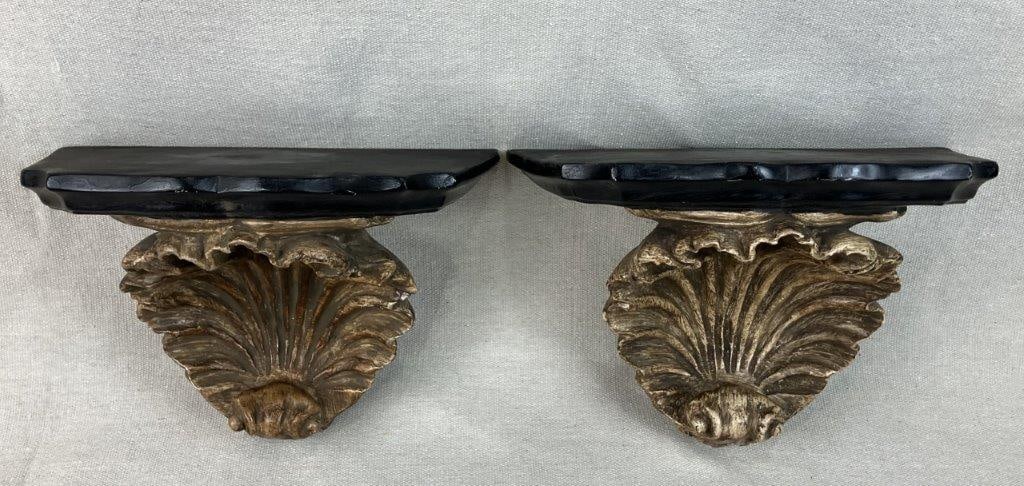 Pair of Renaissance Revival Shell Motif Shelves: Elegant pair of Renaissance Revival bracket shelves features a timeless shell design sculpted into the base, beautifully reminiscent of classic European architectural models. Finished with a