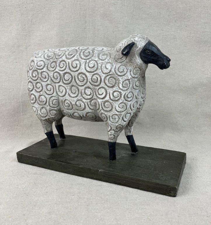 David Harden Folk Art Cast Sheep Sculpture: Charming folk art sculpture by noted artisan David Harden features a heavy cast form delightfully depicting a sheep adorned with stylized, intricate swirl-work wool that beautifully exemplifies