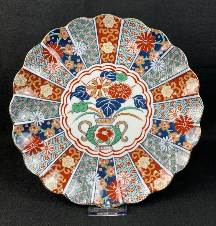 Japanese Imari Plate: An excellent modern example of the traditional Japanese Imari form beautifully honors the rich heritage of the craft. The design features a striking fan-patterned edge framed by an elegant scalloped