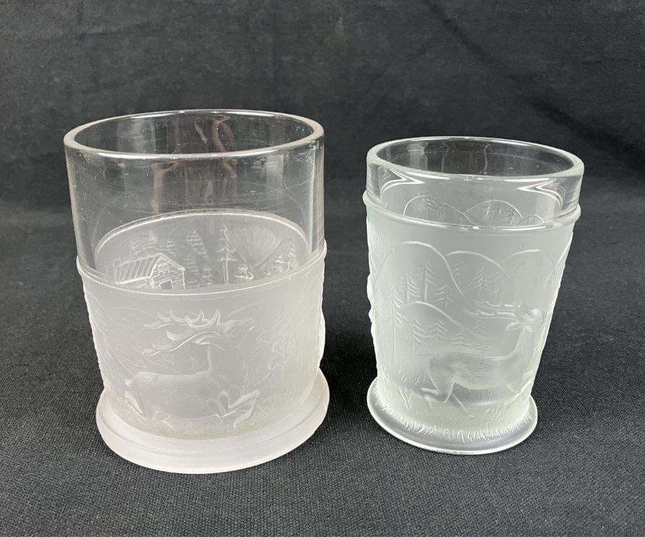 L.G. Wright Westward Ho Glass Jars: Appealing pair of pressed glass jars, dating to circa 1930, beautifully captures the nostalgia and pioneering spirit of the historic 19th-century frontier motif, as successfully revived by the L.G.