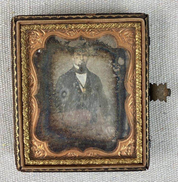 19th Century Portrait Ambrotype: Striking 19th-century portrait ambrotype captures a gentleman with distinctive features, a dignified beard, and a formal suit, offering a captivating glimpse into the early days of photographic