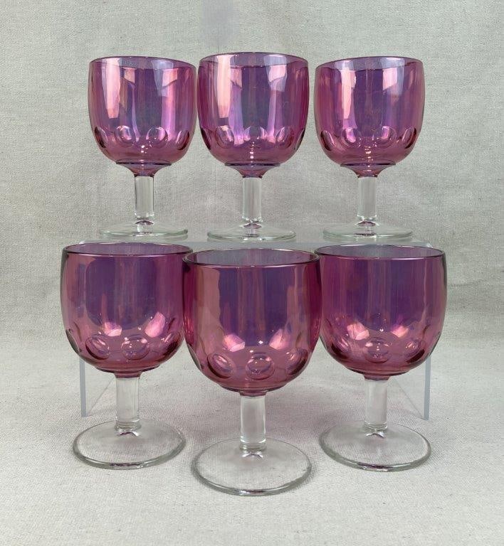 Mid-Century Modern Pink Cranberry Thumbprint Goblets: Elegant set of six mid-century modern glassware pieces features a vibrant pink cranberry hue beautifully enhanced by a classic thumbprint pattern that catches and refracts light with excellent