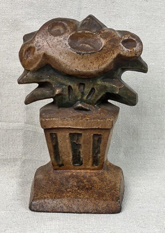 Art Deco Floral Doorstop: An attractive Art Deco floral doorstop of wonderful form, featuring a nice aged patina. It measures approximately 7 inches high x 5Â½ inches wide x 2Â¾ inches deep. In good