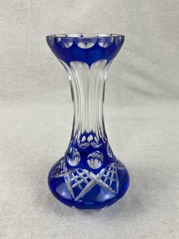 Bohemian Cobalt Blue Cut-to-Clear Glass Vase: Striking Bohemian art glass vase features a classic cut-to-clear technique, where a rich, vibrant layer of cobalt blue glass is meticulously hand-cut to reveal the brilliant, translucent clear