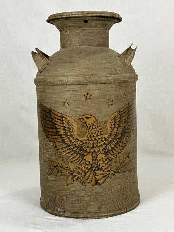 Patriotic Eagle Painted Milk Can: A patriotic painted milk can featuring a nicely rendered Federal eagle with nice old and weathered paint. It measures approximately 24 inches high x 12 inches in diameter. Some loss to the paint consi