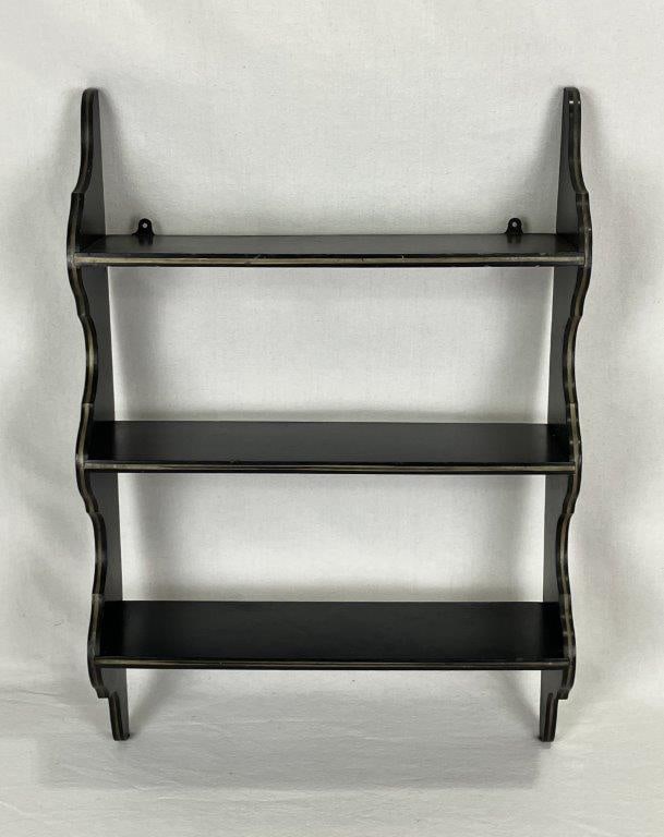 Painted Country Shelf: A charming painted country shelf featuring a black ground with gold painted decoration and attractively shaped sides. The piece displays honest country craftsmanship with good proportions and a