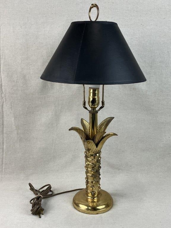 Brass Palm Tree Lamp: Striking table lamp features a luminous brass construction sculpted into an exotic palm tree form, beautifully capturing the whimsical elegance and a sculptural luxury.The lamp measures approximately