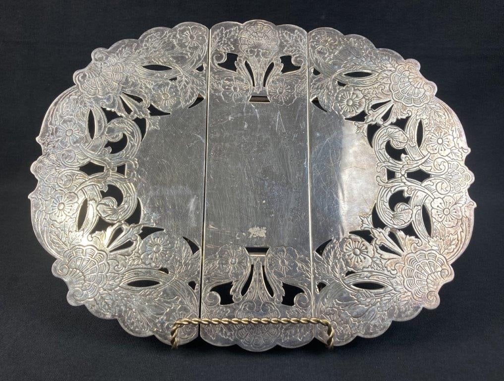 Lawrence B. Smith Co. Silver Plate Trivet: Expandable serving trivet by the Lawrence B. Smith Company features a beautiful, Rococo-inspired flower and shell motif decorating its adjustable frame. Marked "EPNS" for electroplated nickel silver,