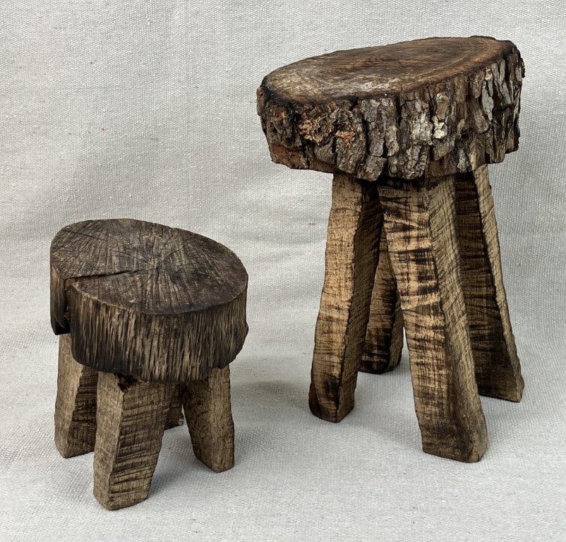 Pair of Small Folk Art Pine Tree Trunk Stools: This charming pair of rustic folk art stools showcases expert independent craftsmanship, celebrating the organic beauty of primitive woodworking. Artfully constructed from pine wood, the stools