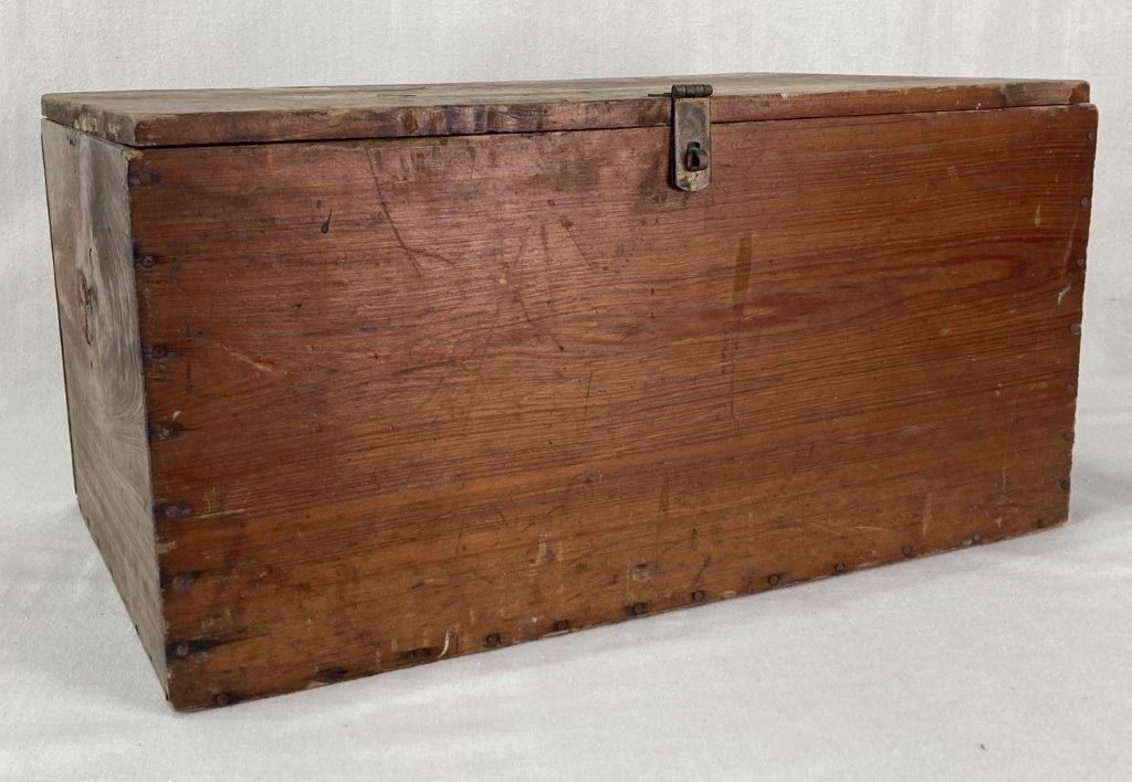 Primitive Country Storage Box: A primitively built rectangular country storage box with a hinged lid and brass latch, featuring nail construction and warm wood selection. The piece displays a worn, aged patina characteristic of