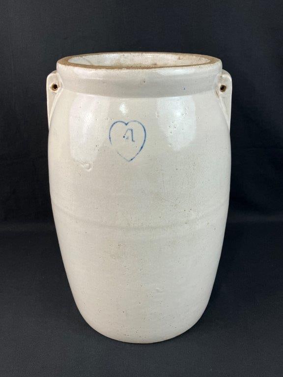 Four-Gallon Stoneware Churn: Glazed stoneware butter churn beautifully showcases the rustic charm and folk art heritage of early American utilitarian pottery. Featuring a substantial four-gallon capacity within its slightly curvi