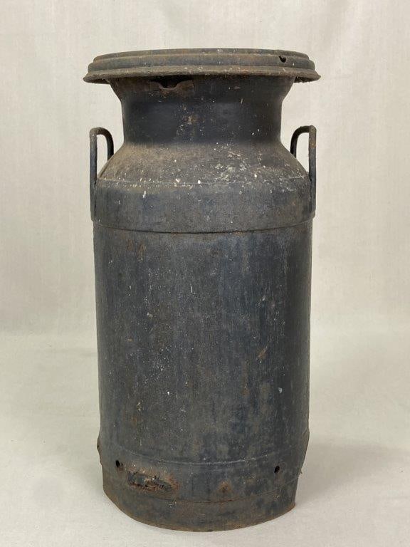 Metal Milk Can: Striking metal milk can features a bold black finish and a commanding, large stature that perfectly embodies a classic country farmhouse aesthetic. Measuring approximately 21 in. H x 10 5/8 in. in