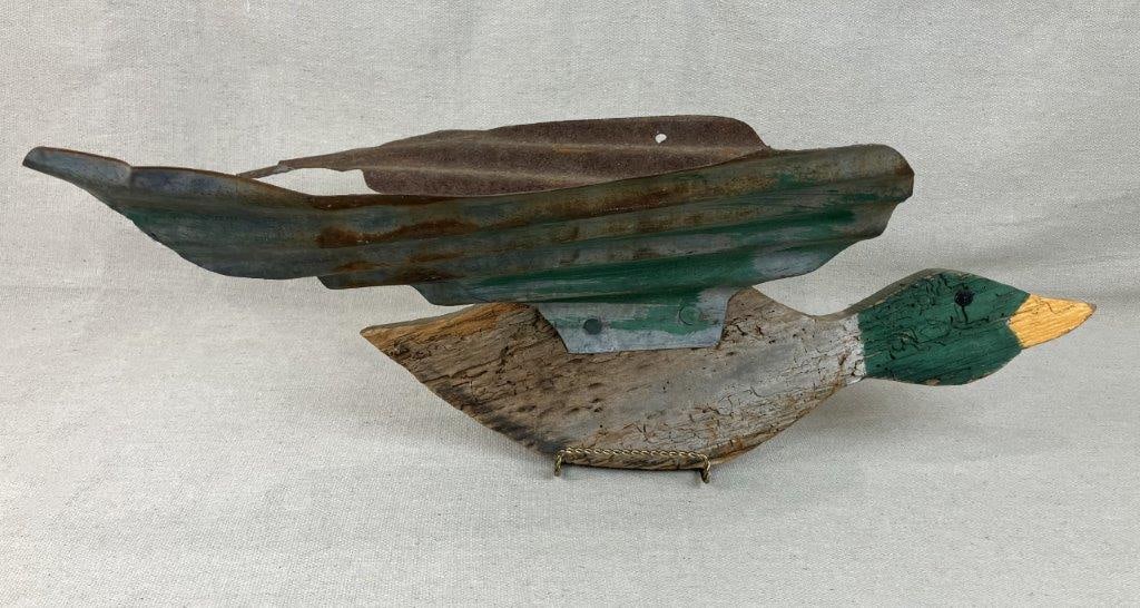 Folk Art Polychromed Wood Mallard Duck: Captivating folk art carving features a stylized mallard duck, beautifully constructed with a carved wood body and uniquely accented by attached, painted metal wings. The polychromed finish showcases