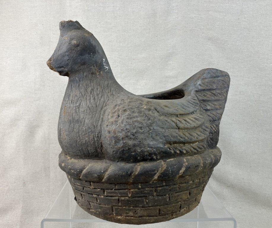 Hen on Nest Garden Planter: Charming figural planter is robustly composed of durable cast concrete and finished in a rich, dark tone that beautifully accentuates its whimsical folk-art design. Depicting a classic hen