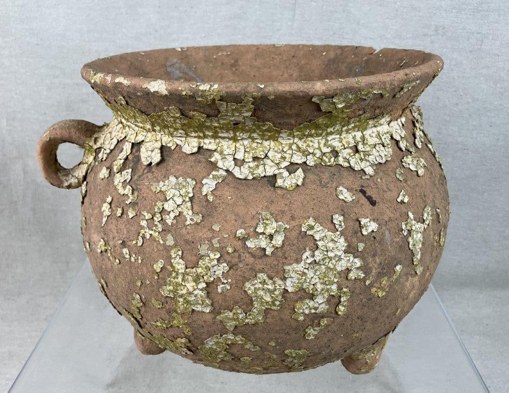 White-Painted Terracotta Planter: Distinctive garden planter is crafted from rustic terracotta clay, beautifully enveloped in a wonderfully chipped white paint finish. Featuring a stately footed form and an elegant applied handle.
