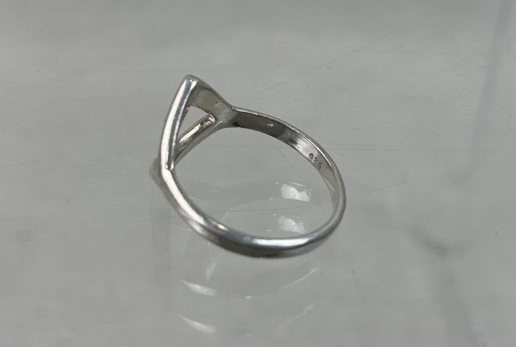 Four Sterling Silver Rings - 4