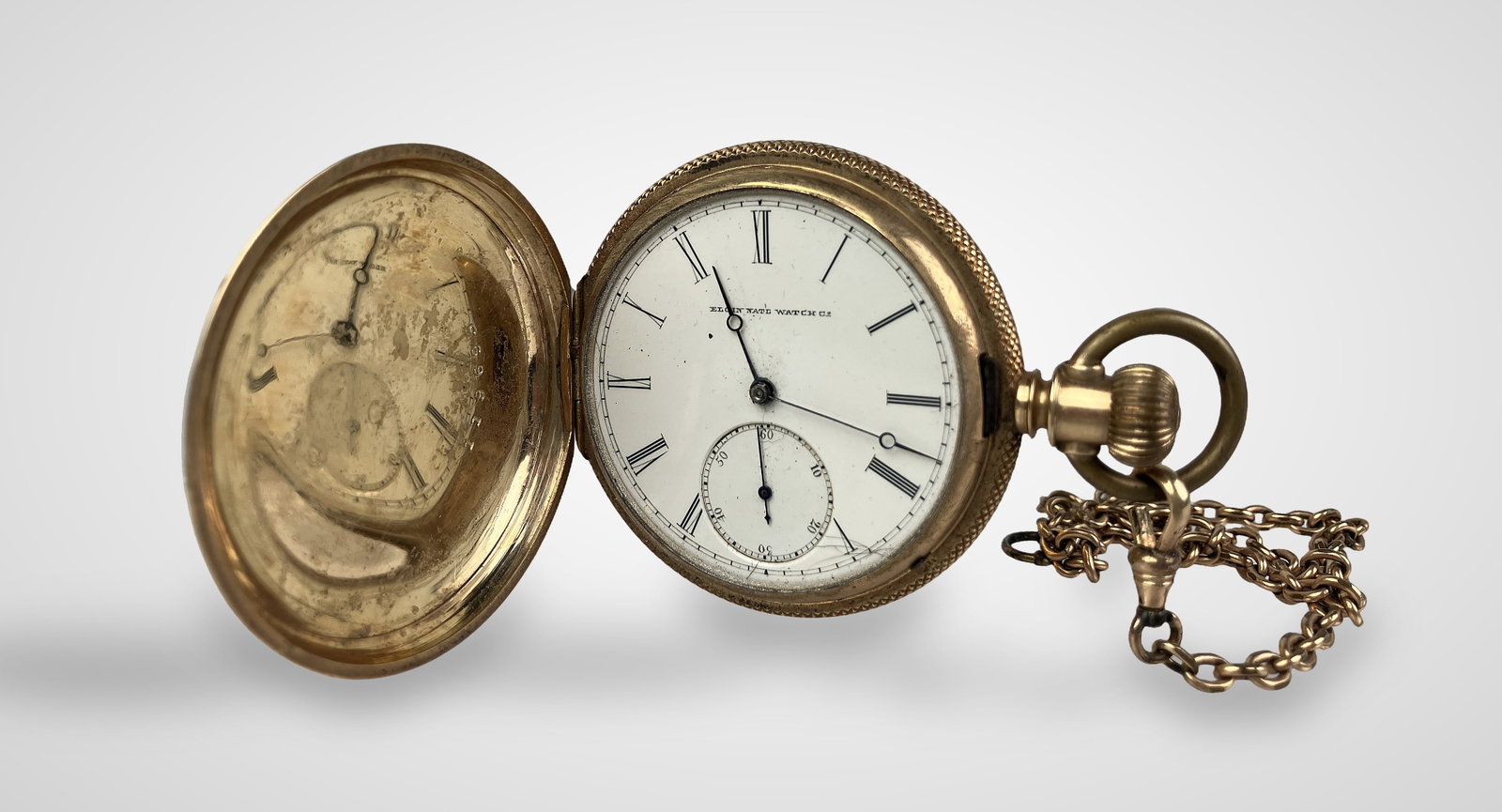 10KT Brooklyn Watch Co. Pocket Watch,19th Century: Late 19th-century timepiece is marked with the company name and a lion mark, the latter denoting its 10kt gold content. The watch features an engraved crest on the front, offering an ideal space for