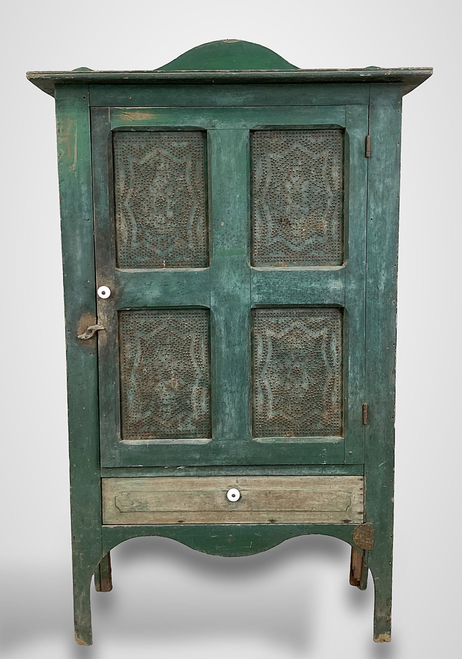 19th-Century Country Painted Pie Safe: Piece exemplifies the American country tradition, featuring a rich forest kelly green painted exterior, inset punched tin panels, a shaped backsplash, and a lower storage drawer supported by raised