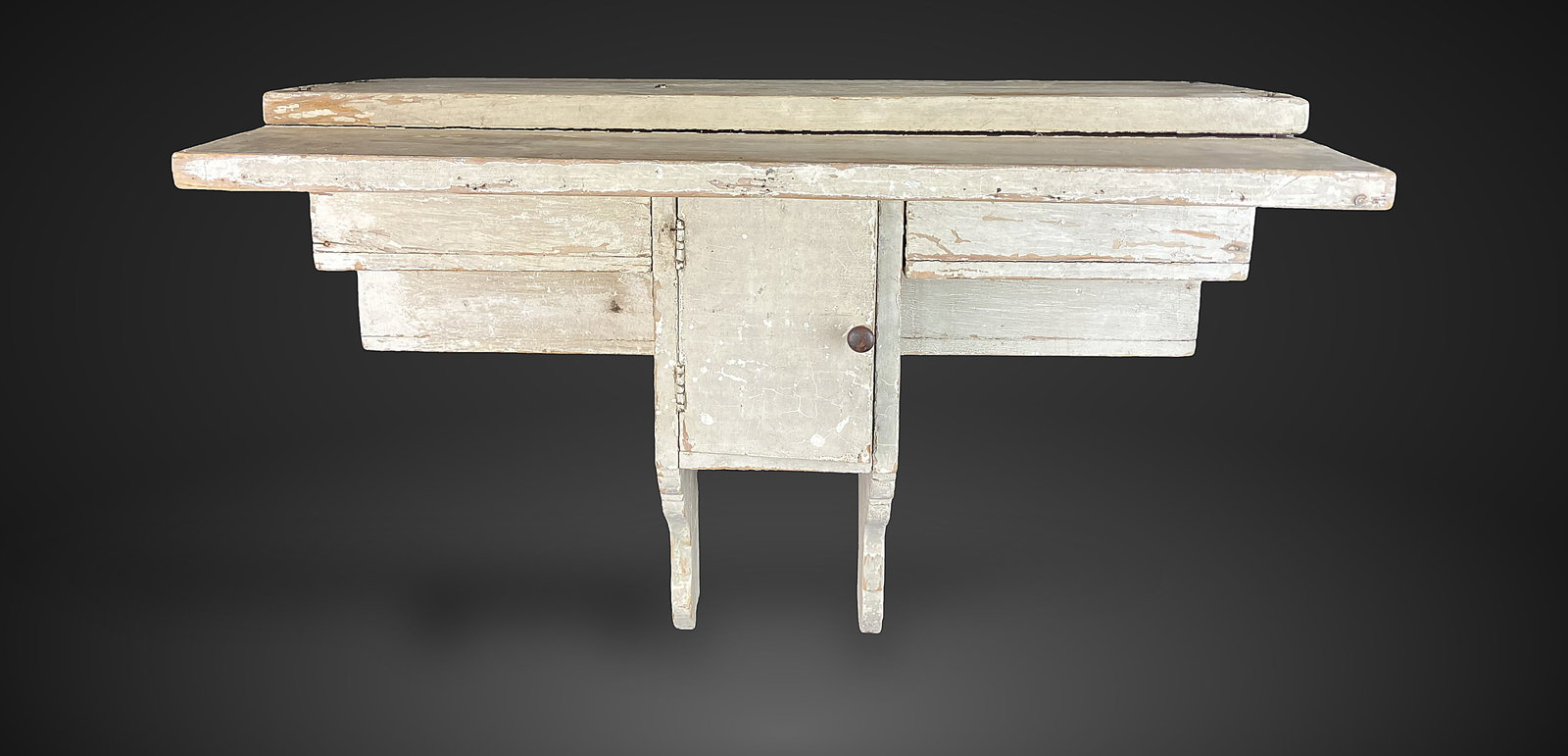 Primitive White Painted Shelf: Piece features a country aesthetic with primitive appeal and a white painted finish. It measures approximately 17 1/4 in. H x 24 in. W x 14 in. D. The shelf shows some wear and includes some loose