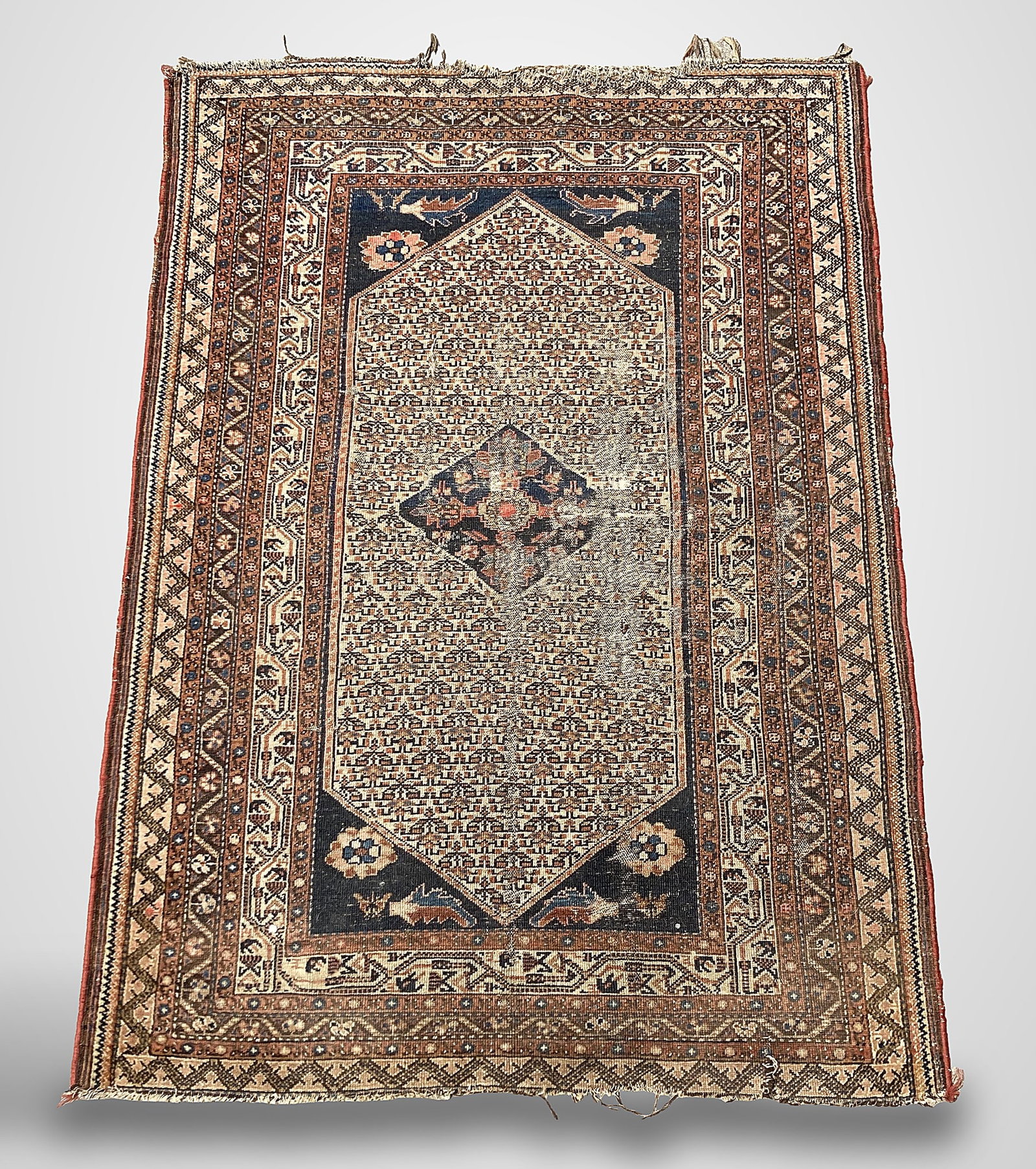 Early 20th Century Bijar Hand Knotted Rug: A late 19th to early 20th century hand knotted Northwest Persian village rug, likely of Kurdish Bijar origin, featuring a finely rendered allover herati field enclosed by multiple geometric floral