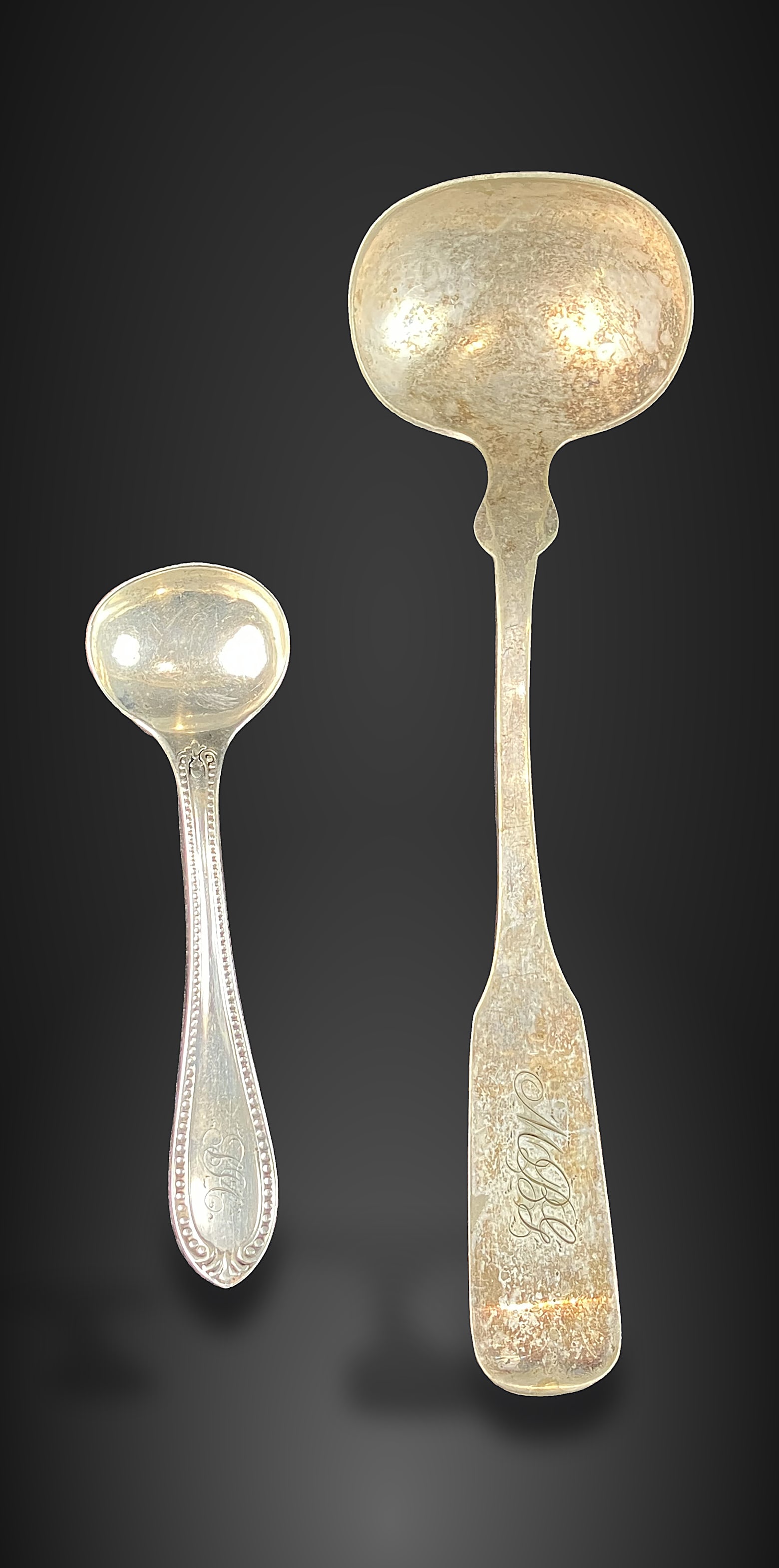 Two Coin Silver Spoons: Duo from the 19th century includes two pieces: one marked J. & J. Hall of Louisville, Kentucky, featuring an elegant form and a monogrammed handle; and one marked Many & Lewis of New York, featuring