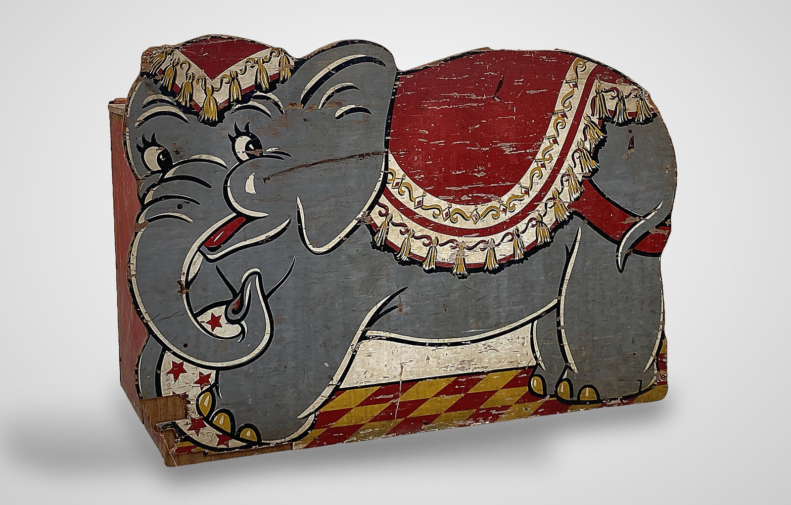 Painted Elephant Toy Chest: This early-to-mid 20th-century piece features a classic construction with a painted elephant cutout on the face in rich red, yellow, and grey tones. It measures approximately 20 5/8 in. H x 30 1/4