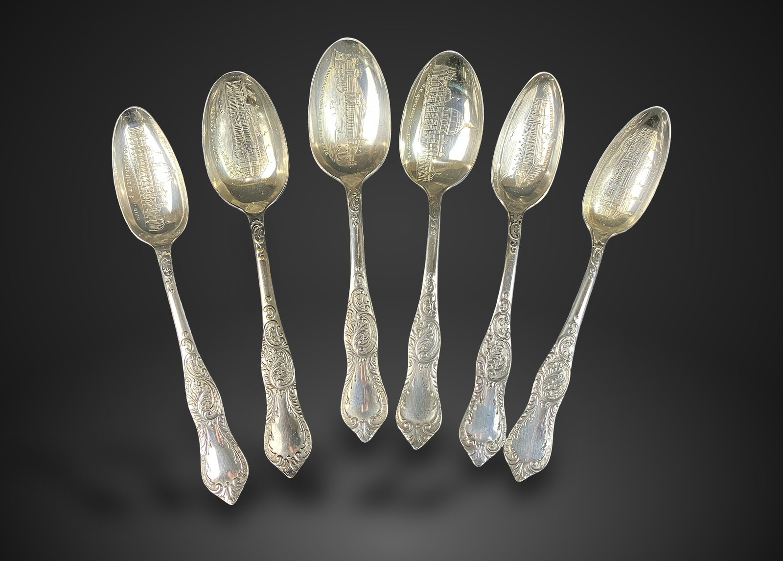 Columbian World's Fair Souvenir Spoons, 1893: Collection of six full-sized silverplate spoons was produced by the Leonard Manufacturing Company. Each spoon features detailed engravings of various buildings and landmarks from the Chicago World's