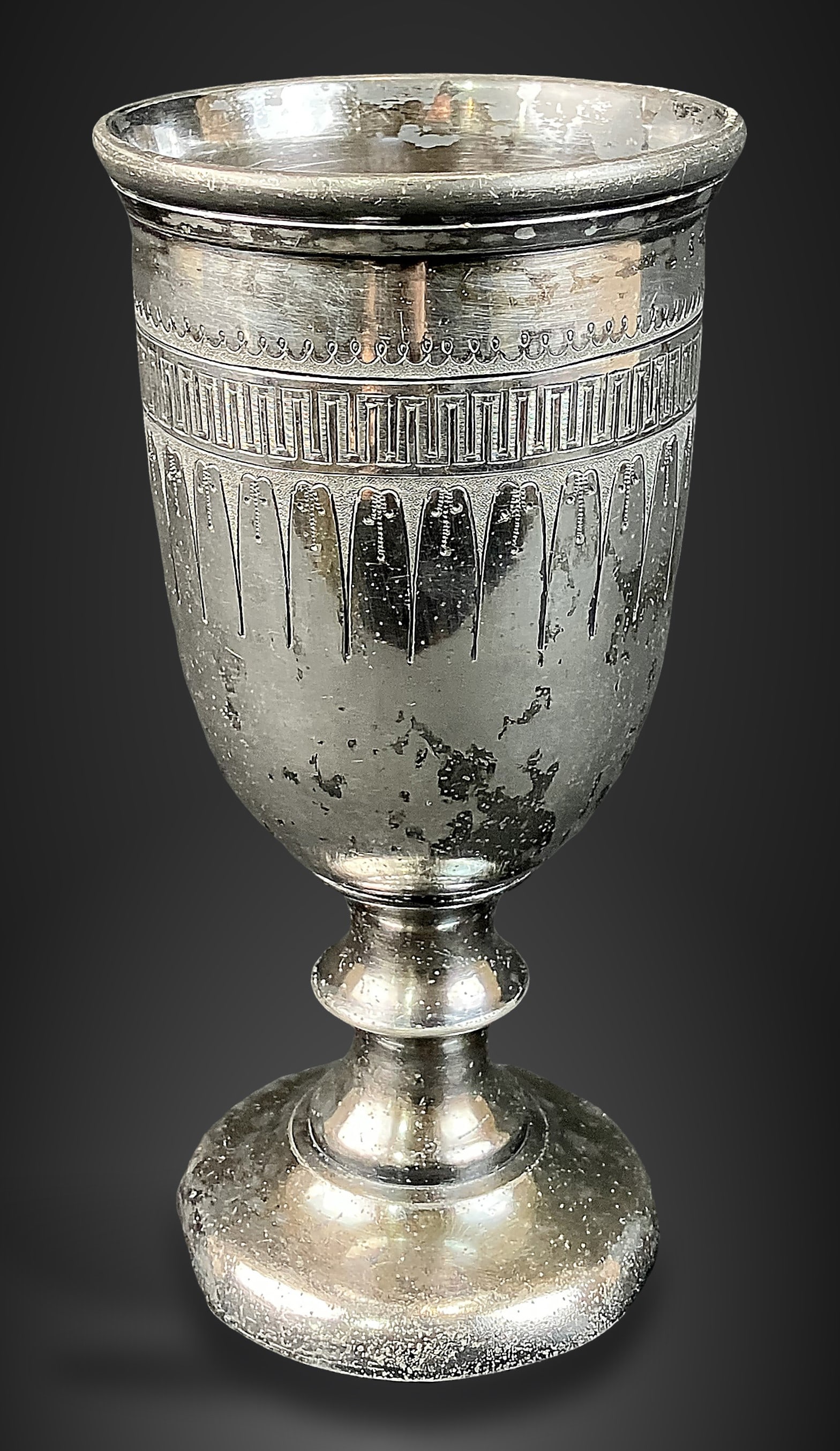19th Century Silver Plate Chalice: Produced by Redfield & Rice, this chalice features a Gothic Revival motif along the upper form, reminiscent of religious patterning and possibly intended for liturgical use. It measures approximately