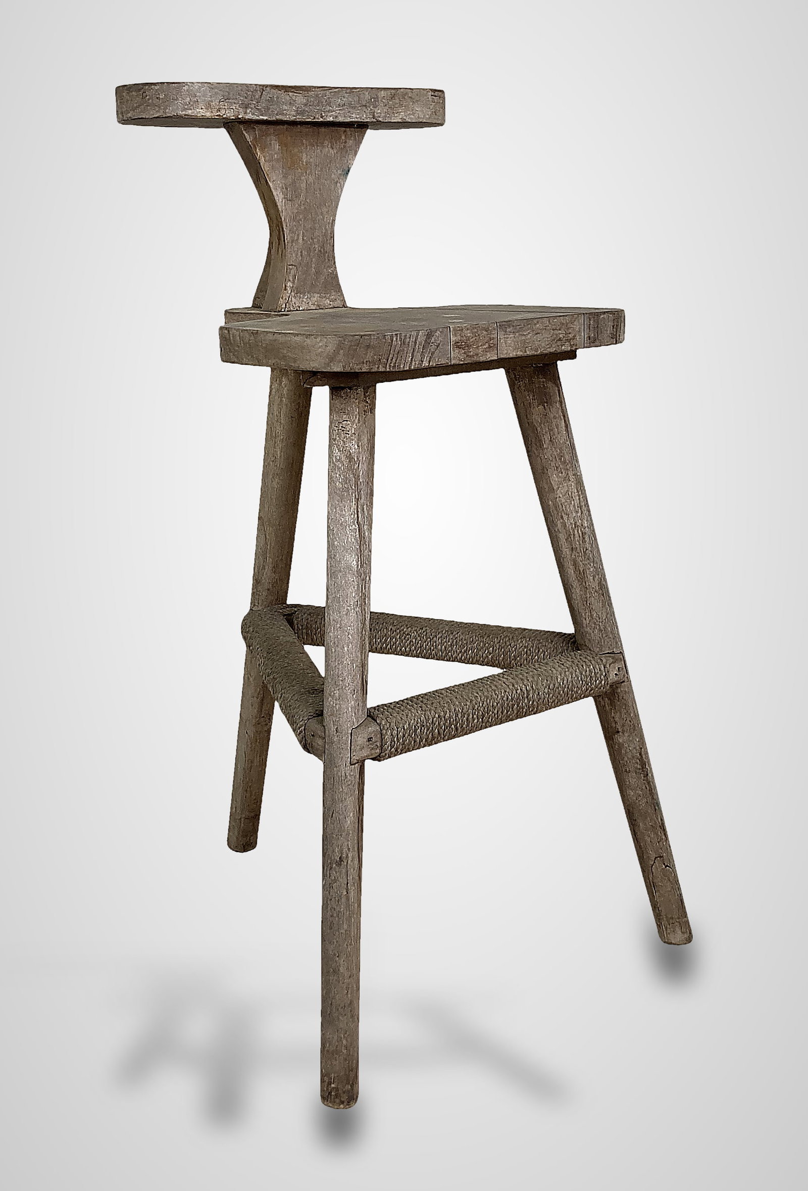 Country Cockfighting Chair: Also known as a betting or library chair, this unique piece features a three-leg design with rope-wrapped posts and a shaped, T-style splat backrest. Constructed from American hardwood, it displays a