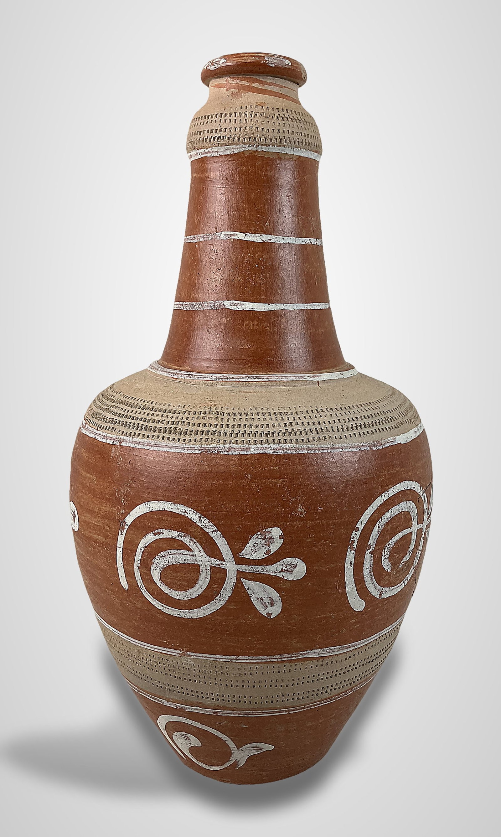South American Terracotta Folk Art Vase: Piece is attributed to Brazilian or Mexican artistry as a moringa de barro, a traditional vessel used for cooling water. It features a painted decorative form enhanced with geometric sgraffito pattern