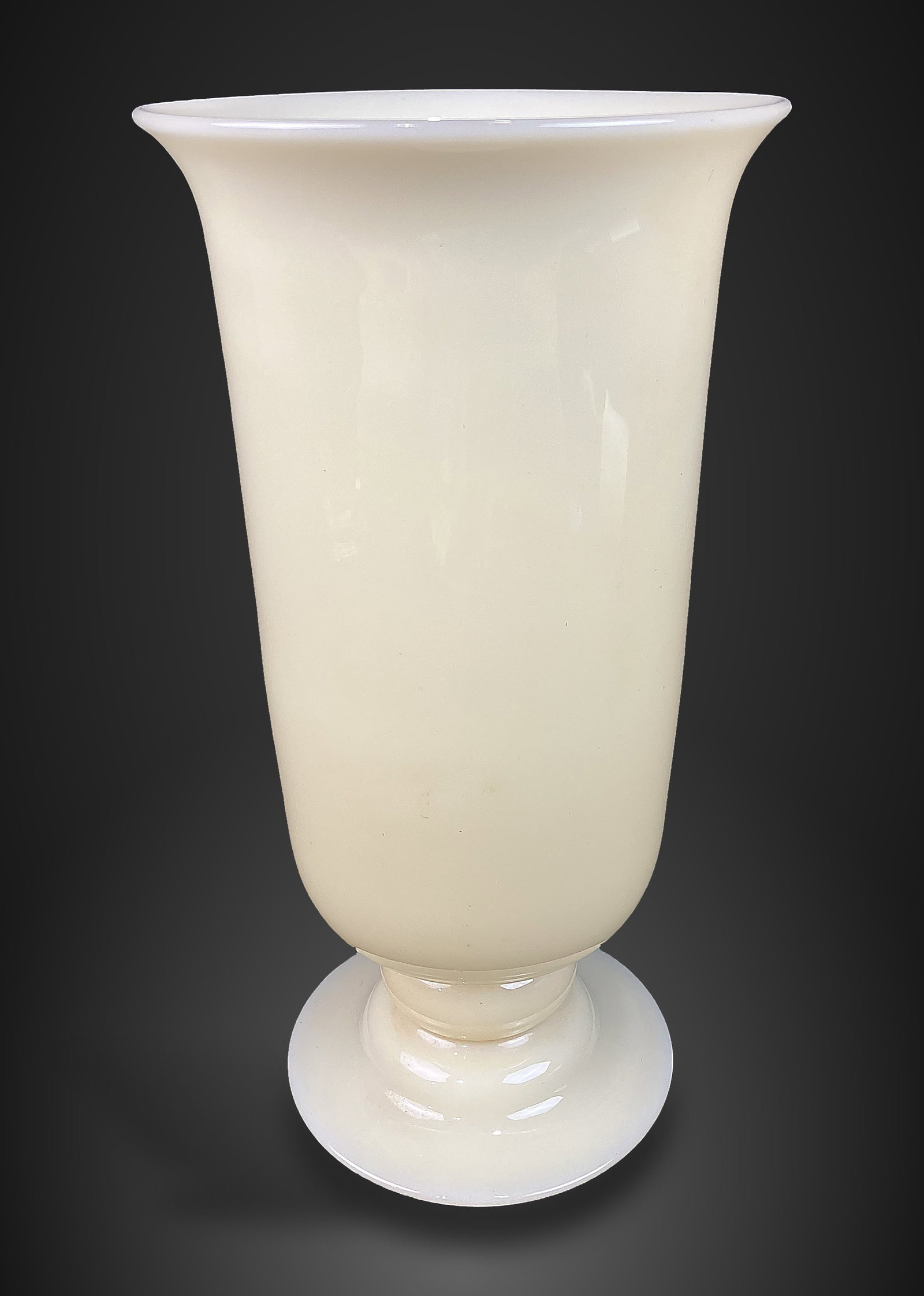 Steuben Ivory Glass Footed Vase: Elegant Art Deco piece is a classic example of Steuben glass in a translucent ivory hue. Designed by the renowned Frederick Carder circa 1930 pattern number 7316, the vase features a refined, footed