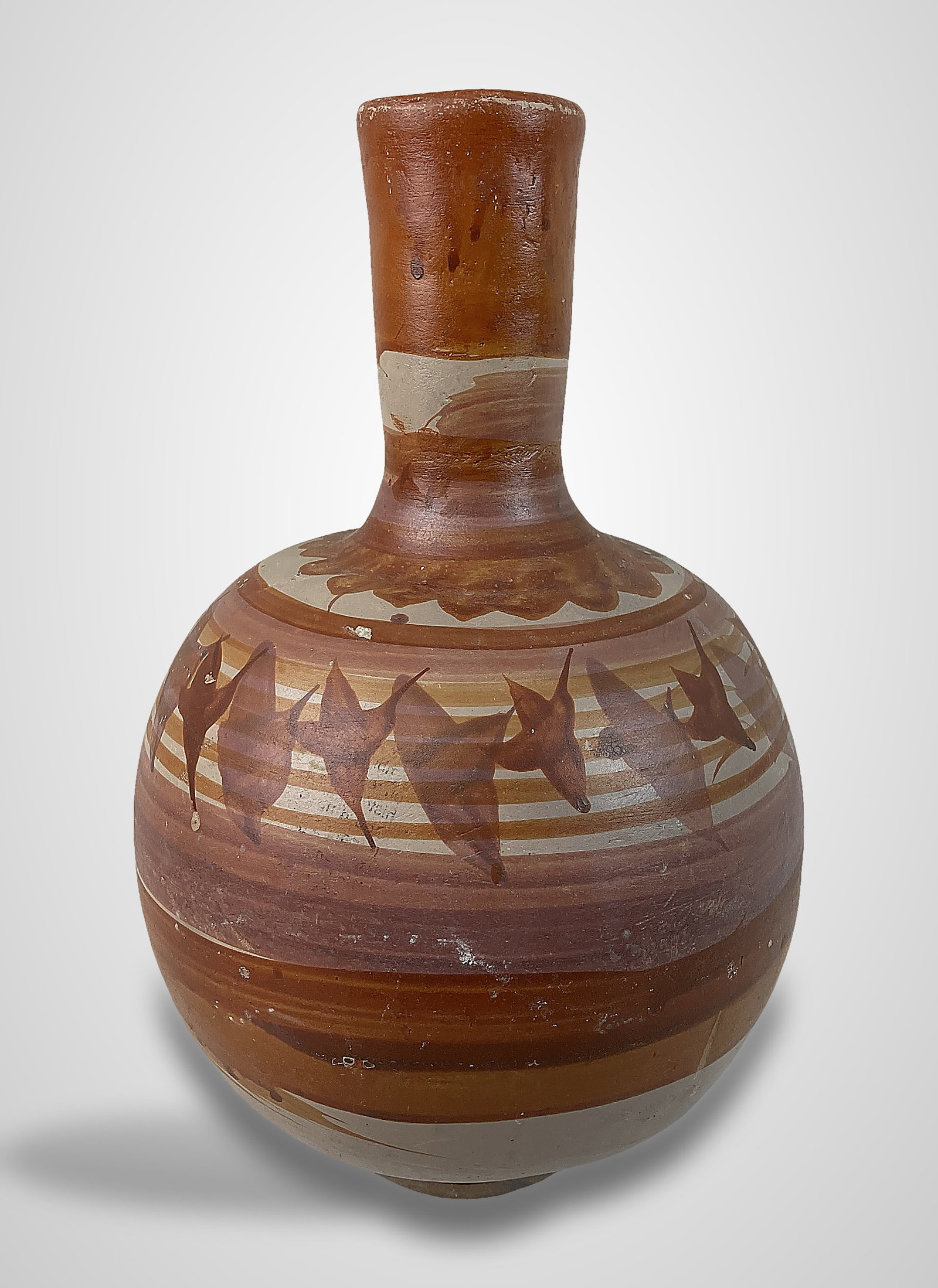 Mexican Tonala Folk Art Pottery Jug: Cantarito or water jug in the style of the Jalisco region, featuring a warm sienna brown form with earth-toned painted designs over a light ground, measuring approximately 13 in. H x 6 1/2 in. in