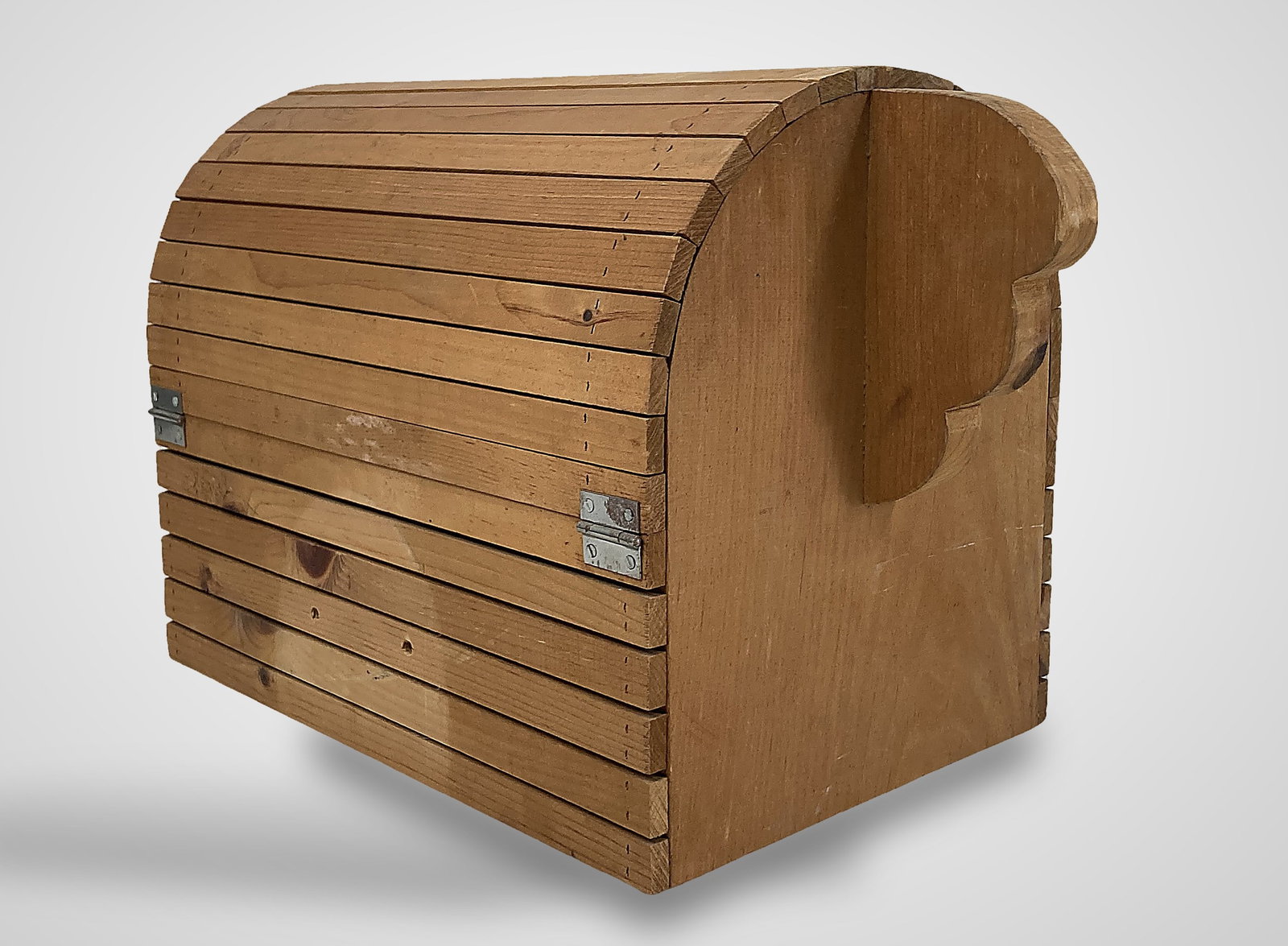 Pine Tambour Box: Storage piece is crafted from strips of pinewood, featuring a tambour-style opening that reveals a spacious interior. It measures approximately 14 1/2 in. H x 12 1/2 in. W x 22 in. D and is in good