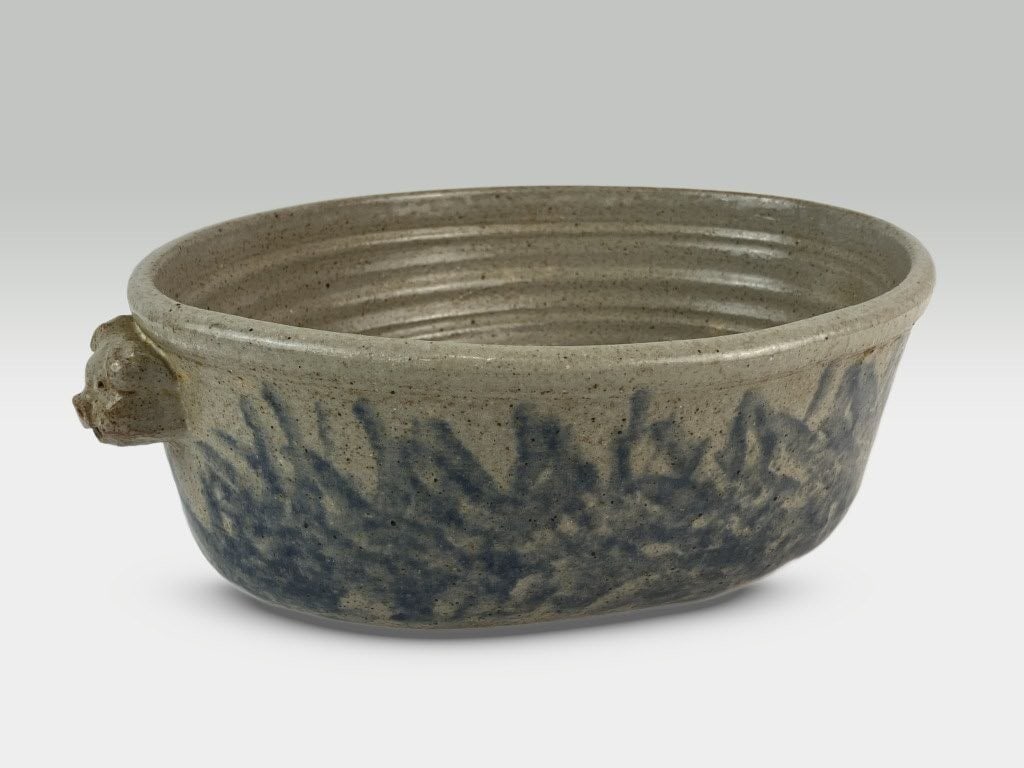 Little Mountain Pottery Salt-Glazed Stoneware Bowl: Salt-glazed piece features the characteristic cobalt sponge-decorated adornments associated with Little Mountain Pottery, which was based in Tryon, North Carolina, and formerly operated by Claude