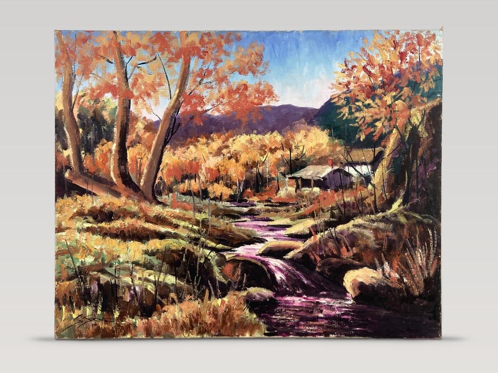 Mid-Century Modern, Autumn Country Landscape, Oil Painting: Mid-century modern oil painting on canvas board depicts a scenic fall country landscape with a nearby lake trees with vibrant orange and red foliage, and a nearby country house at the foot of the