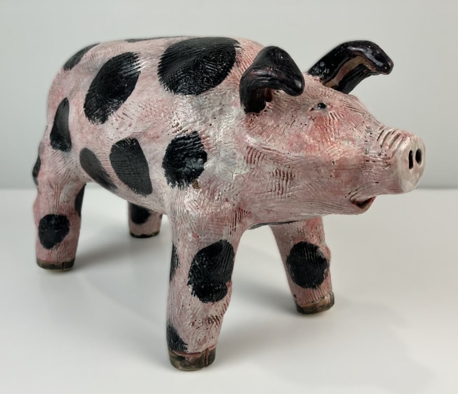 Folk Art Pottery Pig: This southern folk art pottery pig exhibits traditional whimsical form and charmingly expressive features. The spotted body is finished with a pink glaze highlighted by sgraffito decoration defining