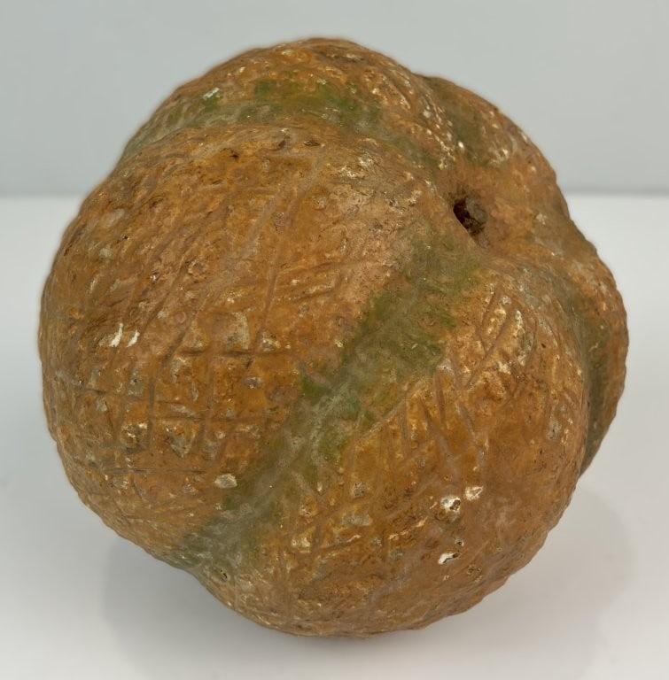Carved Stone Fruit Cantaloupe: This charming piece features a rounded carved alabaster form styled as a stylized Cantaloupe, accented with a hand-painted polychrome finish in warm, autumnal tones. The piece measures approximately
