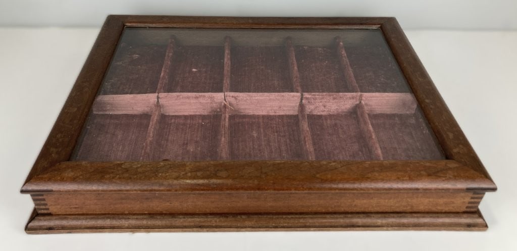 Mahogany Velvet-Lined Display Case: Elegant mahogany display case features a rich exterior with a deep, natural wood patina and a soft muted rose-toned velvet-lined interior. The handsome presentation box measures approximately 3 in. H