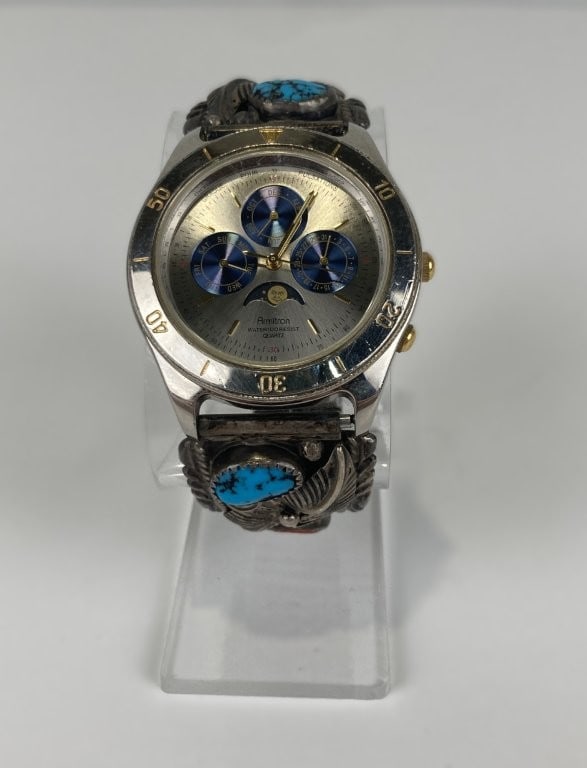 Navajo Sterling Silver and Turquoise Armitron Watch: Exceptional mens statement wristwatch combines a classic Armitron timepiece featuring a moon phase and triple calendar watch face with handcrafted Native American artistry. The stainless steel watch