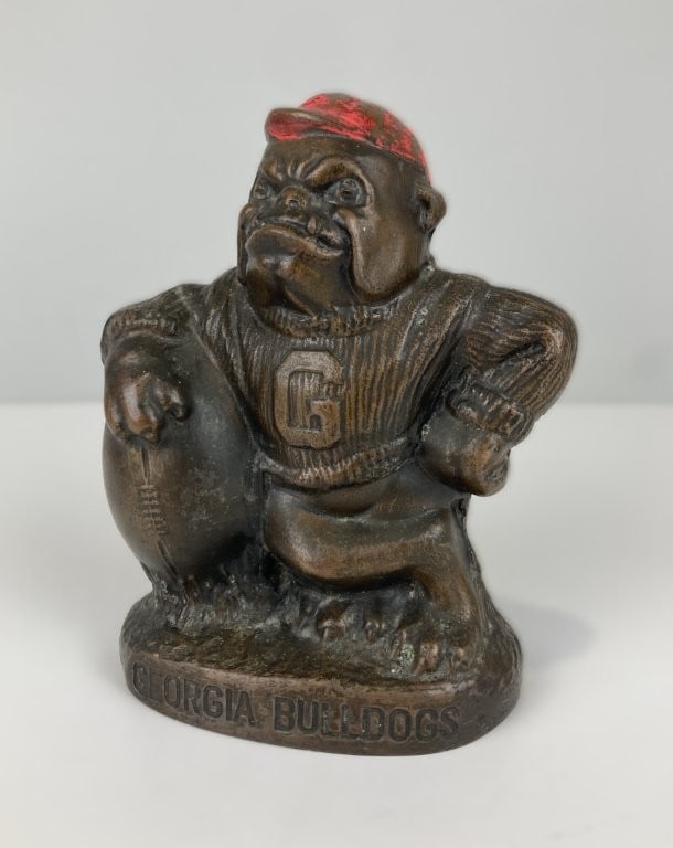 Cast Metal Georgia Bulldogs Mascot Bank: Mid-century figural coin bank depicts the University of Georgia Bulldogs mascot. Produced by the renowned Banthrico company of Chicago—famous for their high-quality promotional and