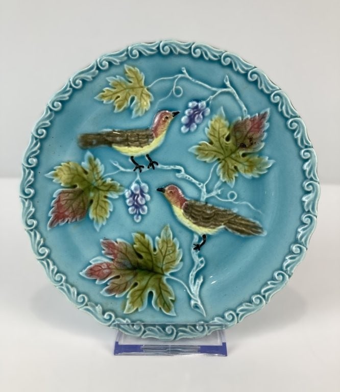 German Zell Majolica Plate: Small decorative majolica plate from the renowned German ceramic factory Zell features a vibrant embossed design of plump grapes and lush foliage intertwined with charming birds, set against a rich,