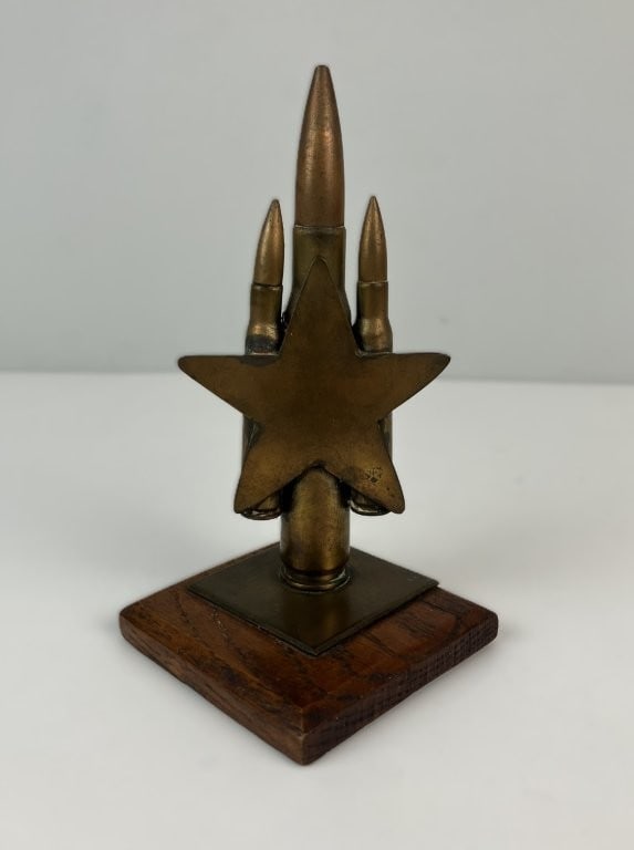 Mid-20th Century Military Trench Art Sculpture: This compelling mid-20th-century trench art sculpture reflects the patriotic craftsmanship of the wartime era, likely dating from World War II or the post-war period. The figural composition features 