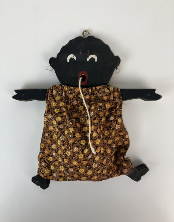 Black Americana Folk Art Doll: Charming Black Americana folk art doll combines practical sewing utility with expressive hand-carved folk craftsmanship. Constructed with a carved wooden figural body, the piece functions as a clever
