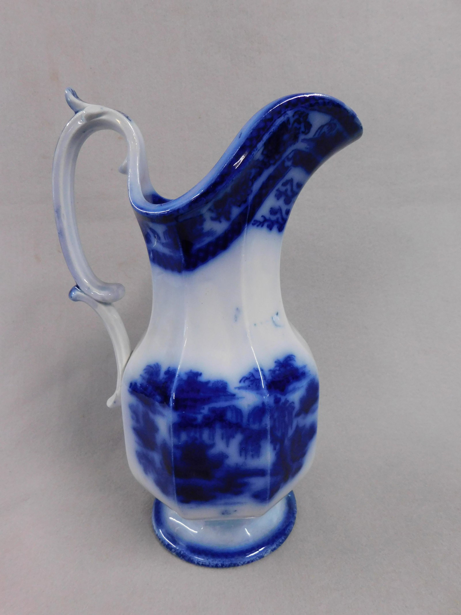 Flow Blue Pitcher: 12 1/2in. H. Flow Blue Water Pitcher - "Manilla" by Podmore Walker in Very Good Cond.