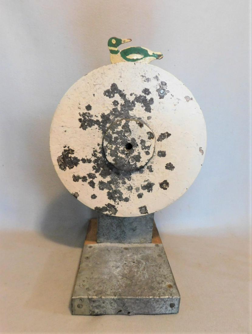 20thC. Iron Disc w/"Duck & Bell Ringer": 20thC. Iron Disc w/Duck & Bell Ringer w/Std. in Gd. Cond. - 14in.H.x12in. W. Attrib. to Wurfflein