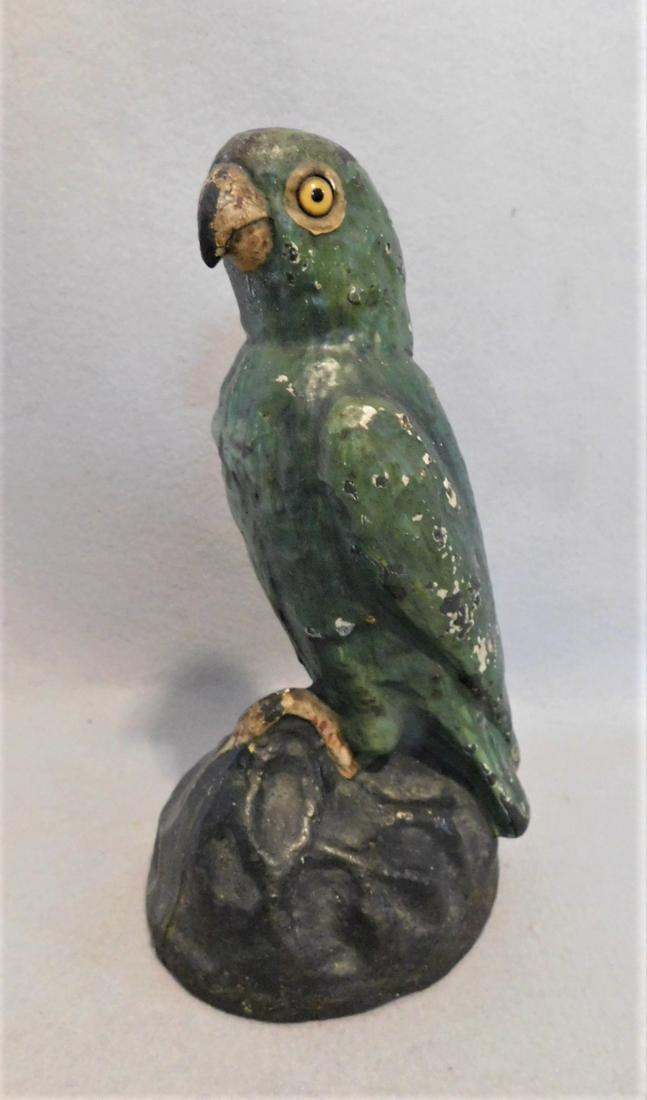 Early Iron "Parrot" Doorstop: Early Iron Parrot Doorstop w/Glass Eyes in VG Cond, 9in. H.x 4 1/2in.W.