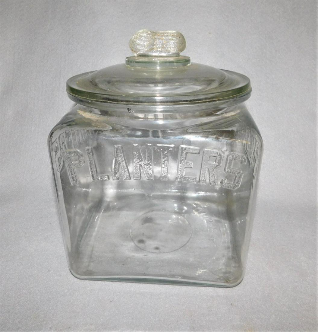 Planter's Peanut Jar: Planter's Peanut Glass Cannister Jar w/Lid (Some Roughness on Lid) in Gd.Cond. - 7in. W. x 9 1/2in.H.