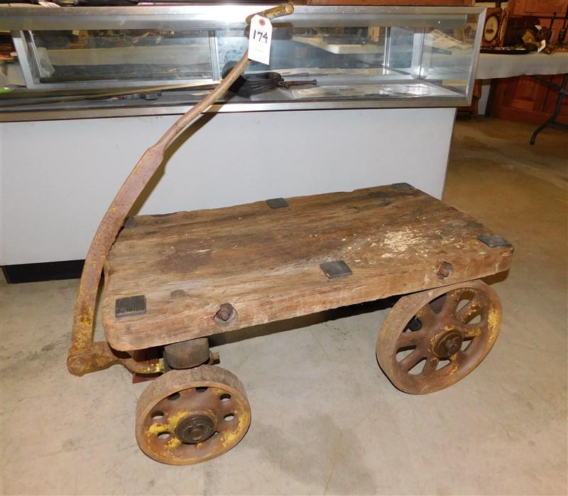 Antique Industrial Wagon: Antique 4 Wheel Iron & Wooden Industrial RR Wagon w/Handle in Gd. Cond. - 37 1/2in.L. 21in.D. x 44 1/2in. to top of Handle x 17in.H. to Bed of Wagon