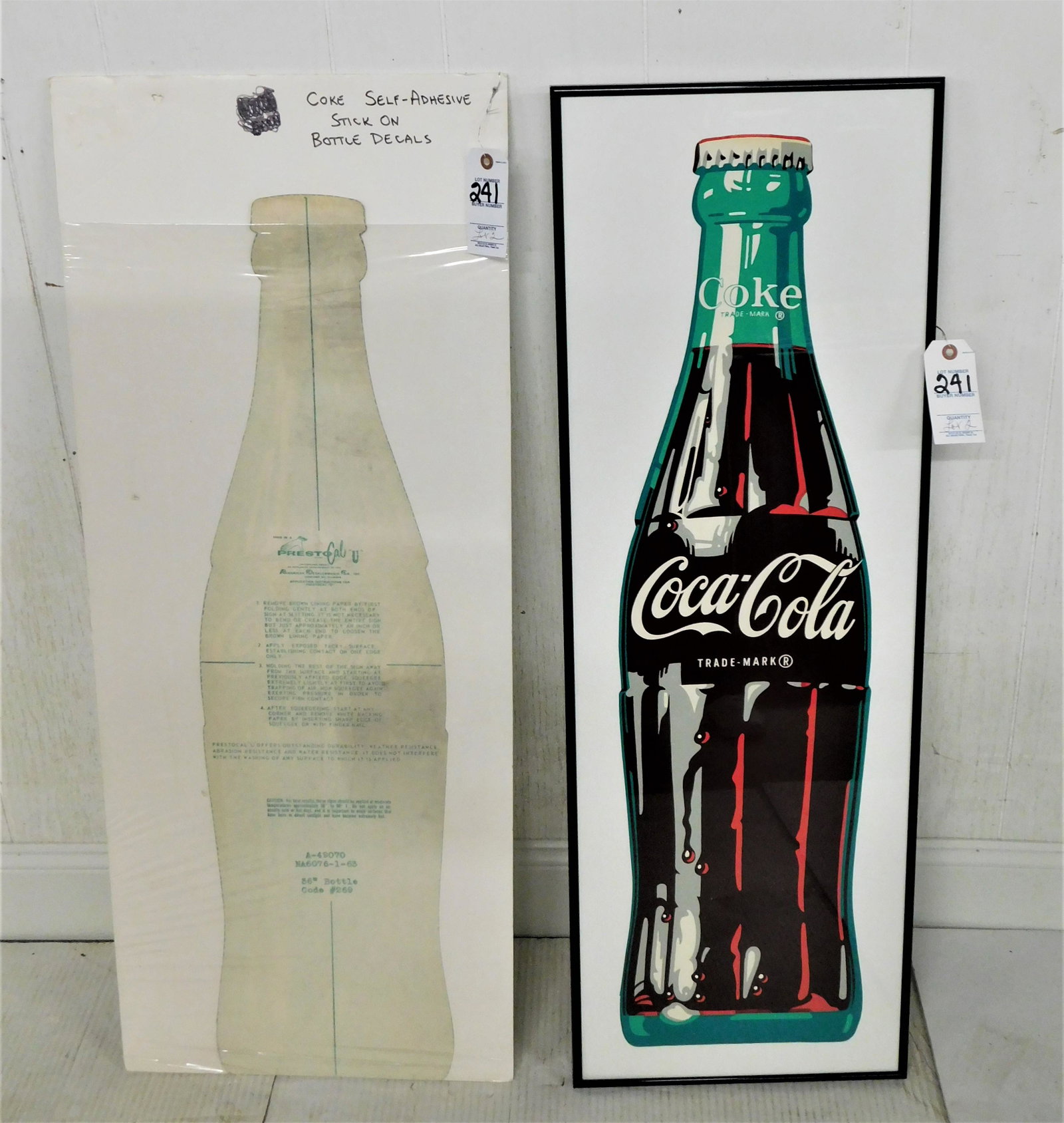 Lot of 2 Vintage Coca-Cola Decals: Lot of 2 Vintage Coca-Cola Decals incl. 1 Unwrapped & Framed Under Glass, The Other is in Orig., Wrapper w/Paper Front & Back to Peel Off , Both in VG Cond. - Frammed Pc.13 1/2x39in.H. - Decal Only 9i