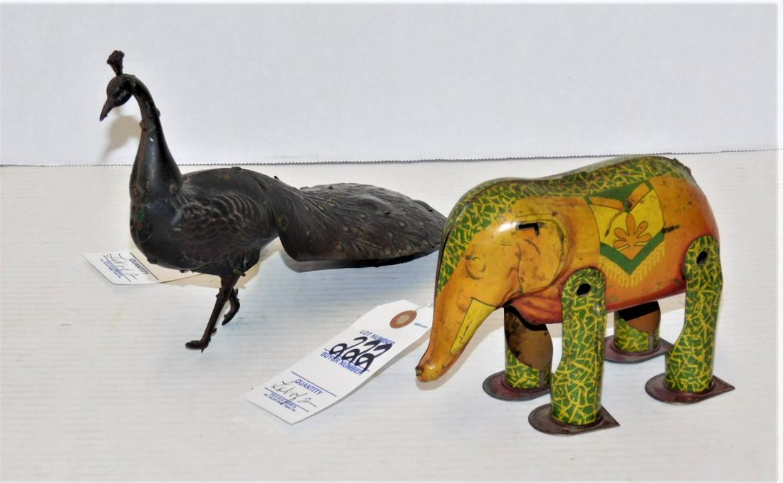 Lot of 2 Metal Windup Toys: Lot of 2 Vintage Metal Windup Toys Incl. a Peacock & Elephant in GD Cond. (They Windup But Do Not Walk)Peacock - 9"L. - Elephant - 6 1/2"L.